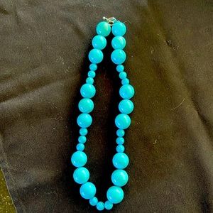 Necklace, aquamarine blue stones.